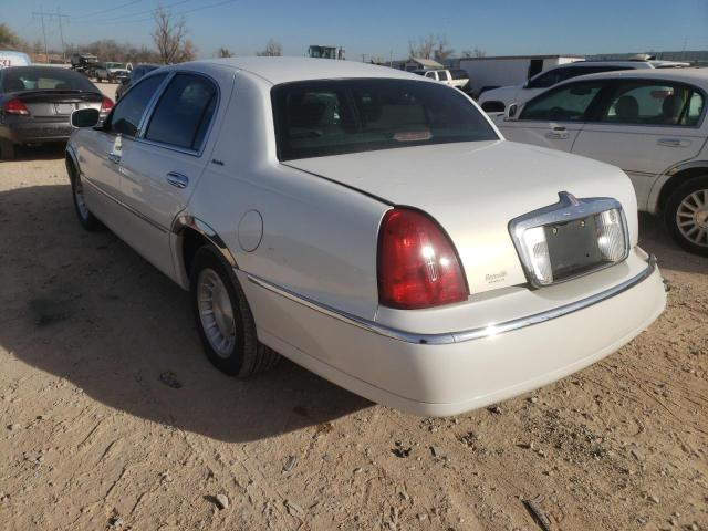 Photo 3 from auction – 2002 LINCOLN TOWN CAR E with VIN 1LNHM81W82Y614142