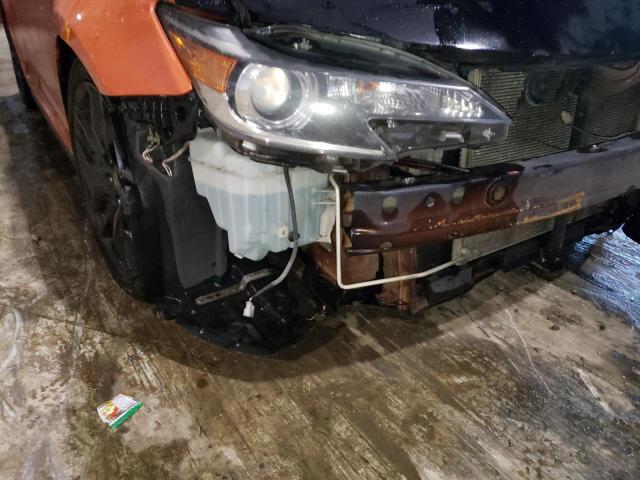 Photo 9 from auction – 2015 TOYOTA SCION TC with VIN JTKJF5C71FJ007334