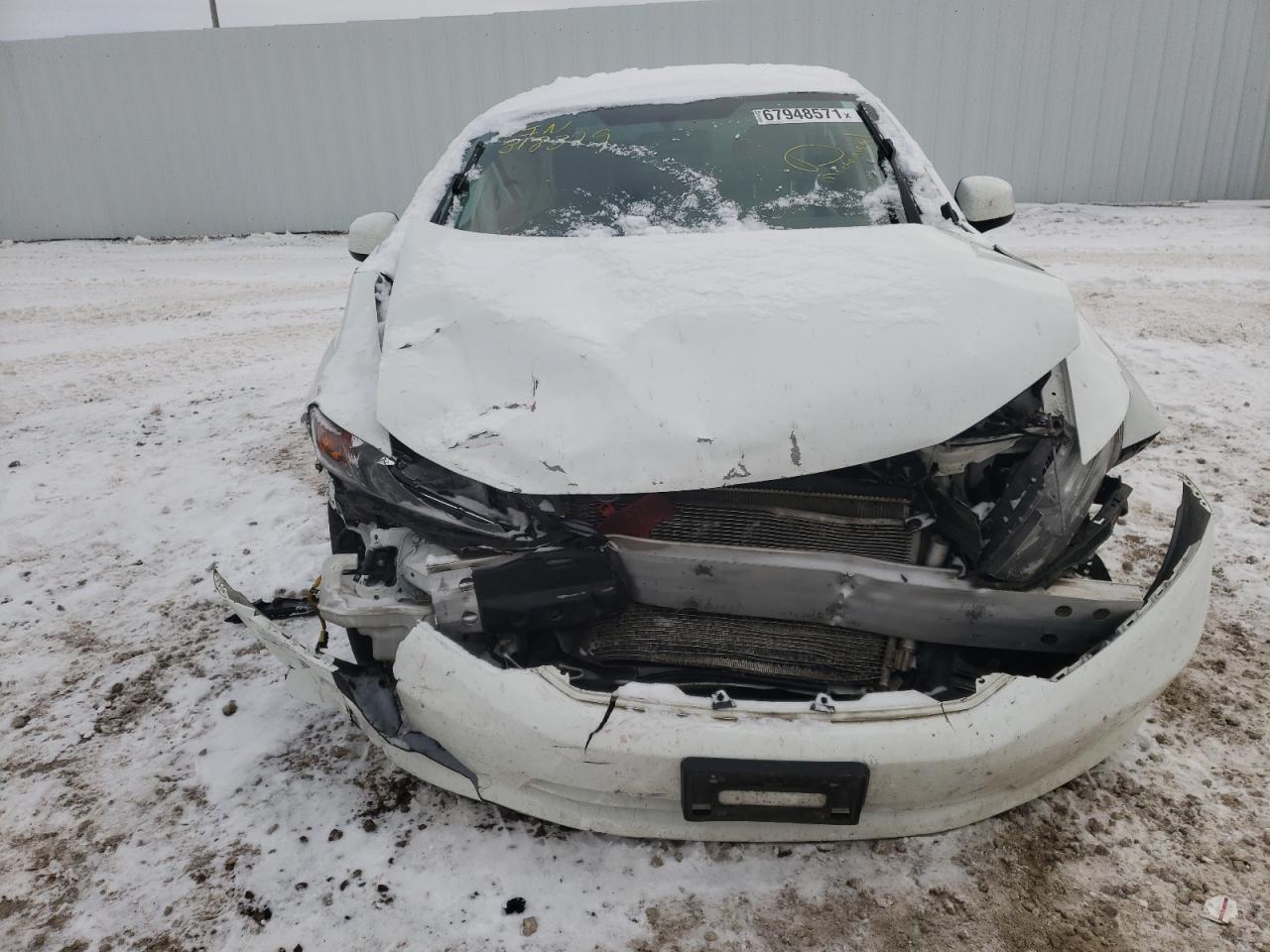 Photo 9 from auction – 2012 HONDA CIVIC LX with VIN 2HGFB2F57CH318329