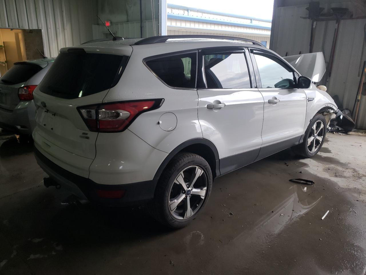 Photo 4 from auction – 2017 FORD ESCAPE SE with VIN 1FMCU9G90HUC83705