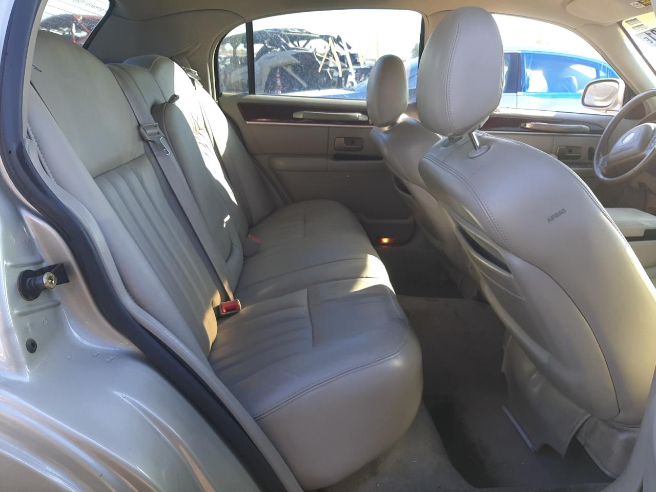 Photo 6 from auction – 2004 LINCOLN TOWN CAR E with VIN 1LNHM81W54Y654018