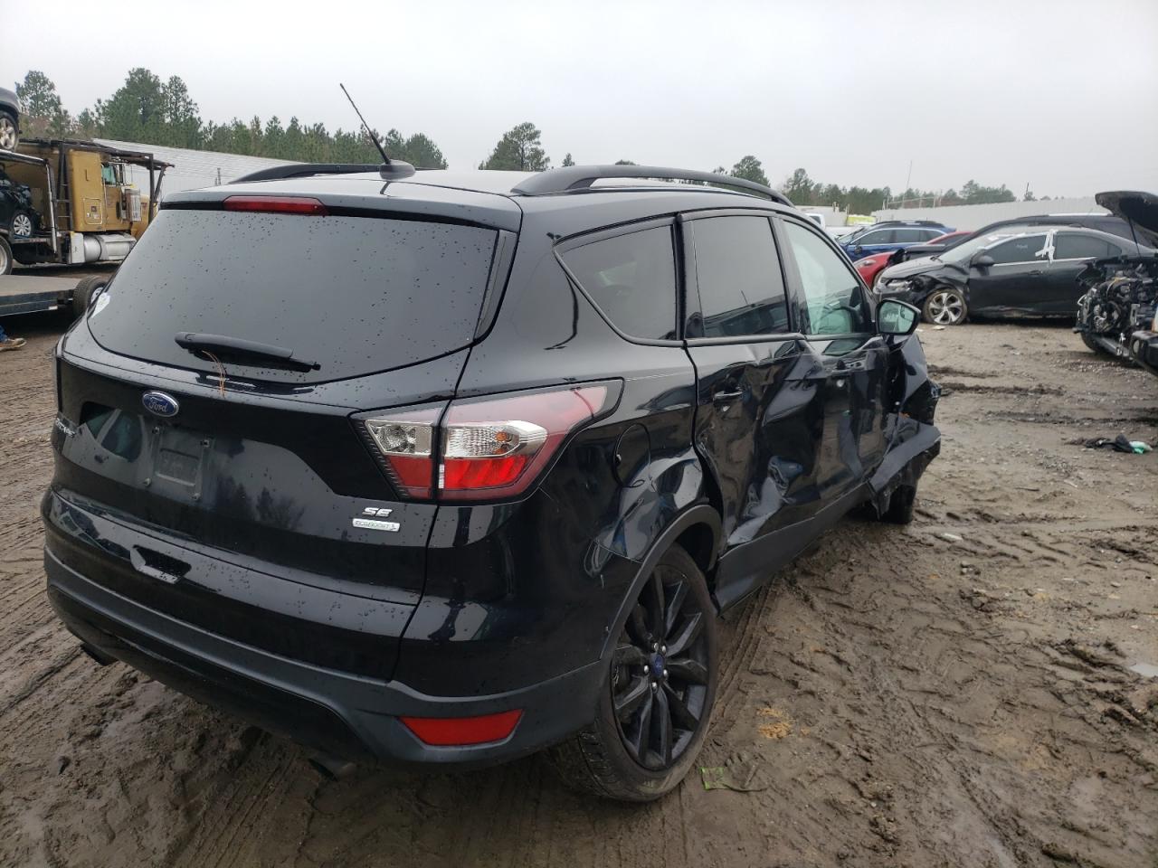 Photo 4 from auction – 2018 FORD ESCAPE SE with VIN 1FMCU0GD9JUB47546
