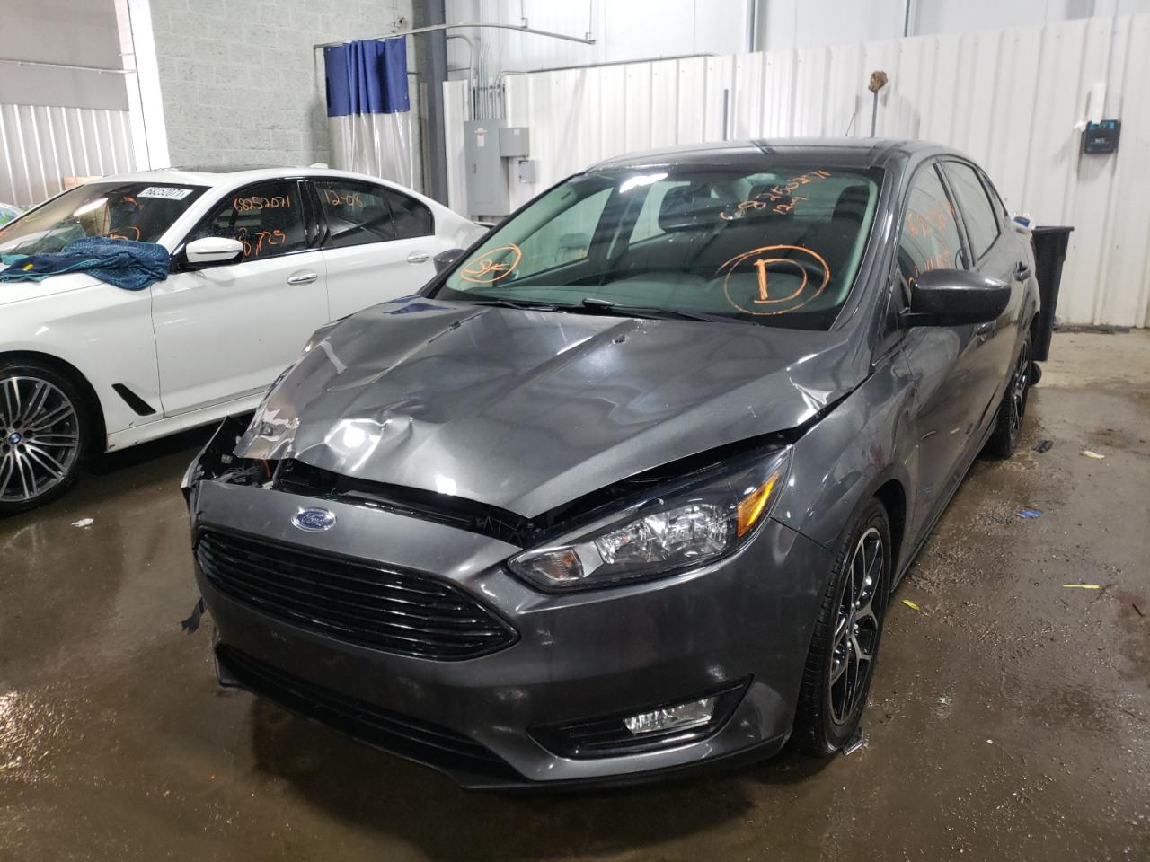 Photo 2 from auction – 2018 FORD FOCUS SE with VIN 1FADP3FE6JL287383
