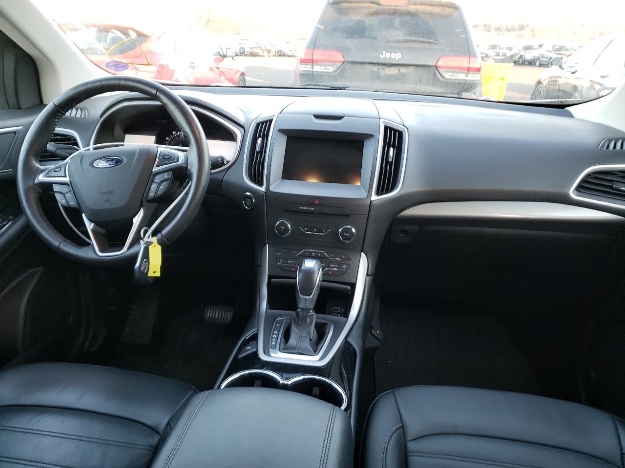 Photo 9 from auction – 2016 FORD EDGE SEL with VIN 2FMPK4J84GBC35056