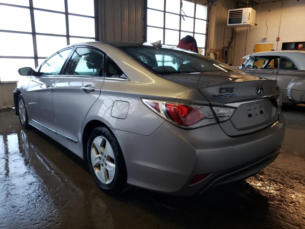 Photo 3 from auction – 2012 HYUNDAI SONATA HYB with VIN KMHEC4A41CA020614