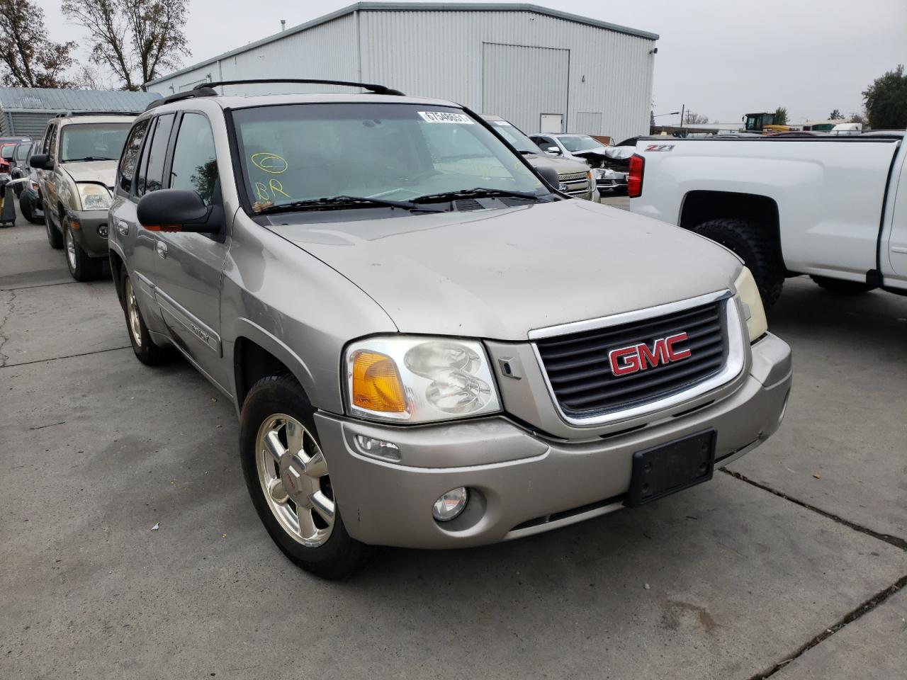 GMC ENVOY 2002 with VIN 1GKDT13S122230704 - Photo from auction