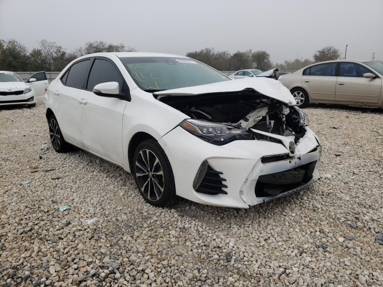 TOYOTA COROLLA L 2017 with VIN 5YFBURHE7HP654710 - Photo from auction