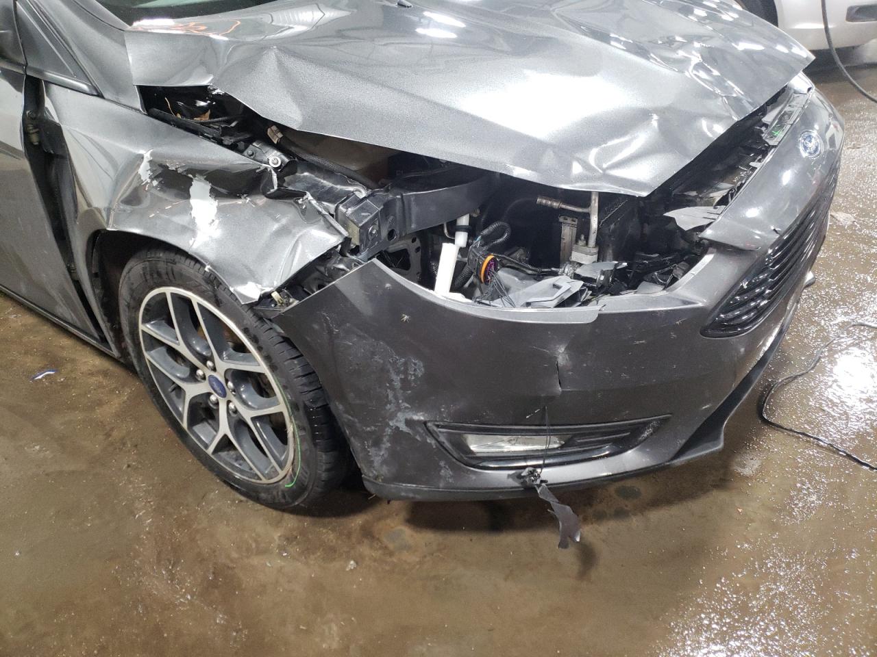 Photo 9 from auction – 2018 FORD FOCUS SE with VIN 1FADP3FE6JL287383