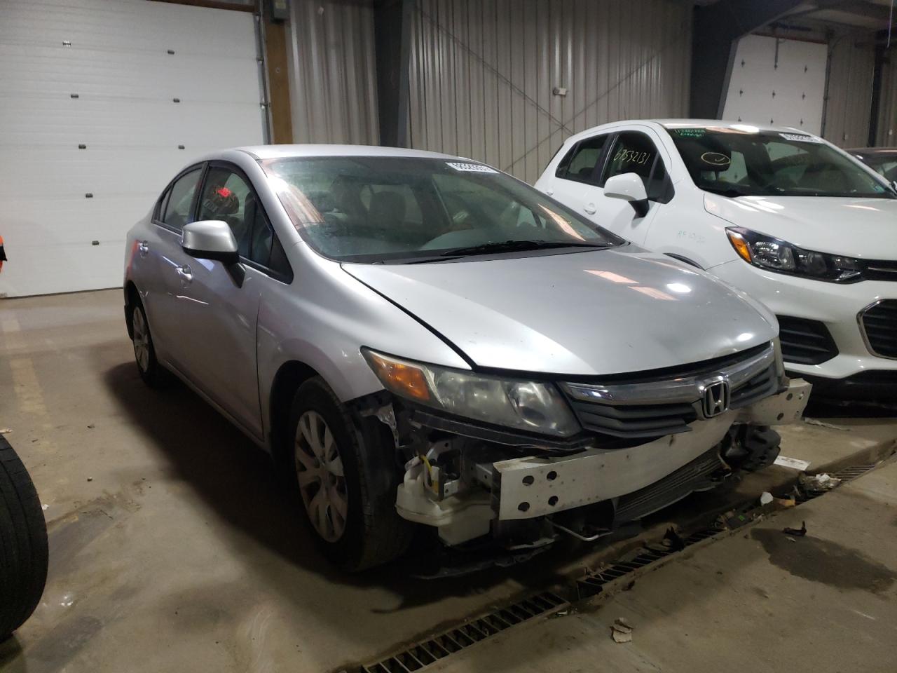 HONDA CIVIC LX 2012 with VIN 19XFB2F58CE330709 - Photo from auction
