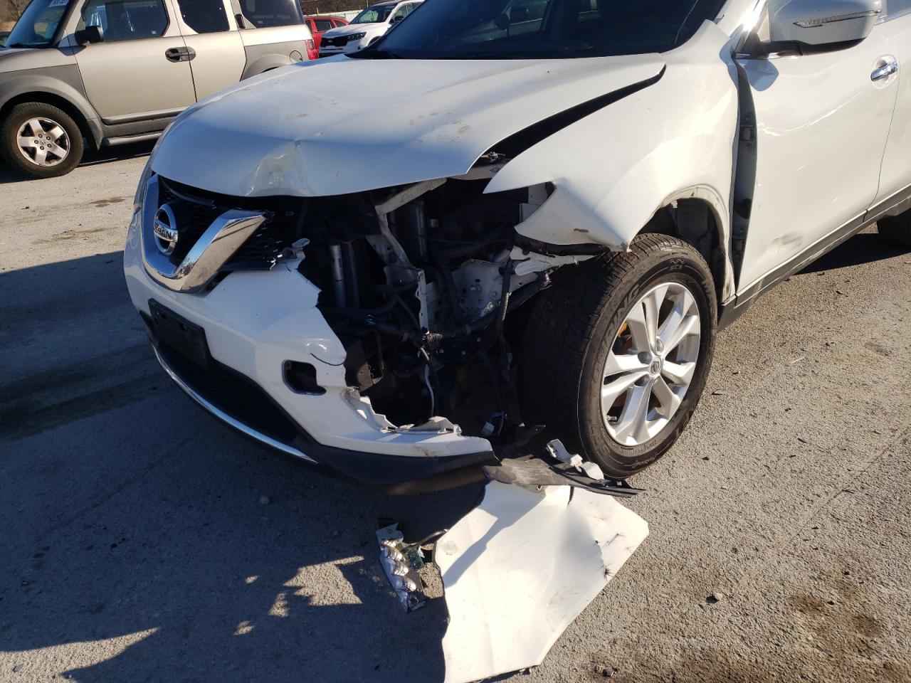 Photo 9 from auction – 2015 NISSAN ROGUE S with VIN 5N1AT2MV6FC907884