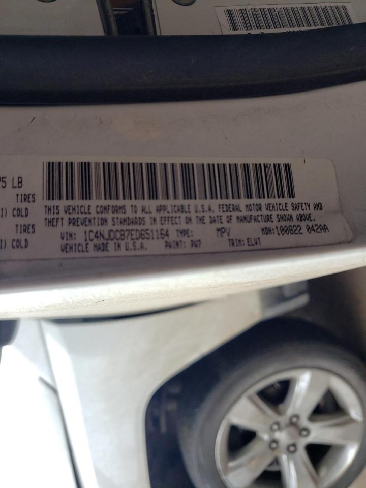 Photo 10 from auction – 2014 JEEP COMPASS LI with VIN 1C4NJDCB7ED651164