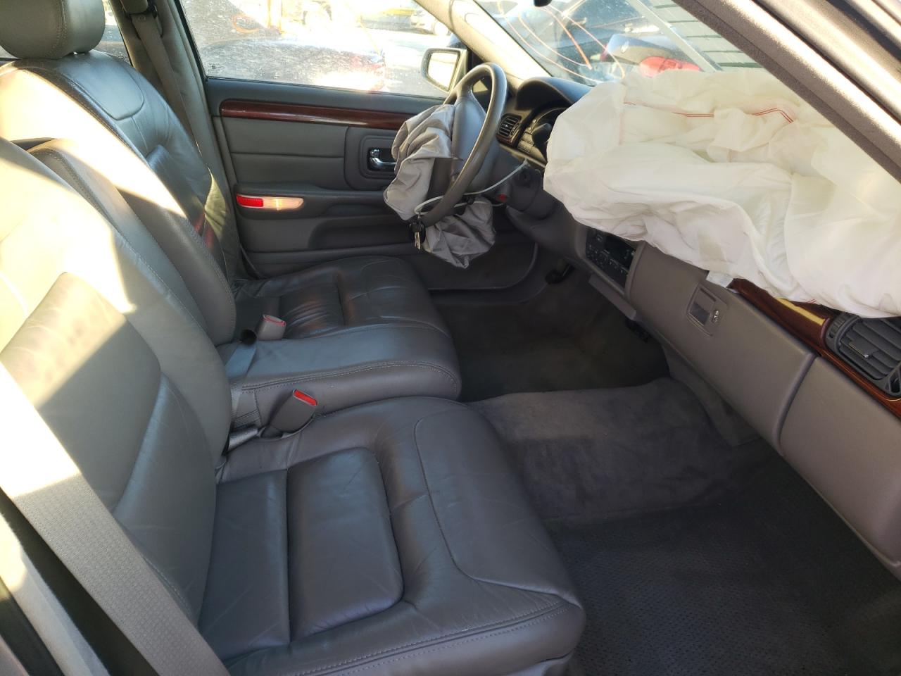 Photo 5 from auction – 1999 CADILLAC DEVILLE with VIN 1G6KD54Y8XU782225