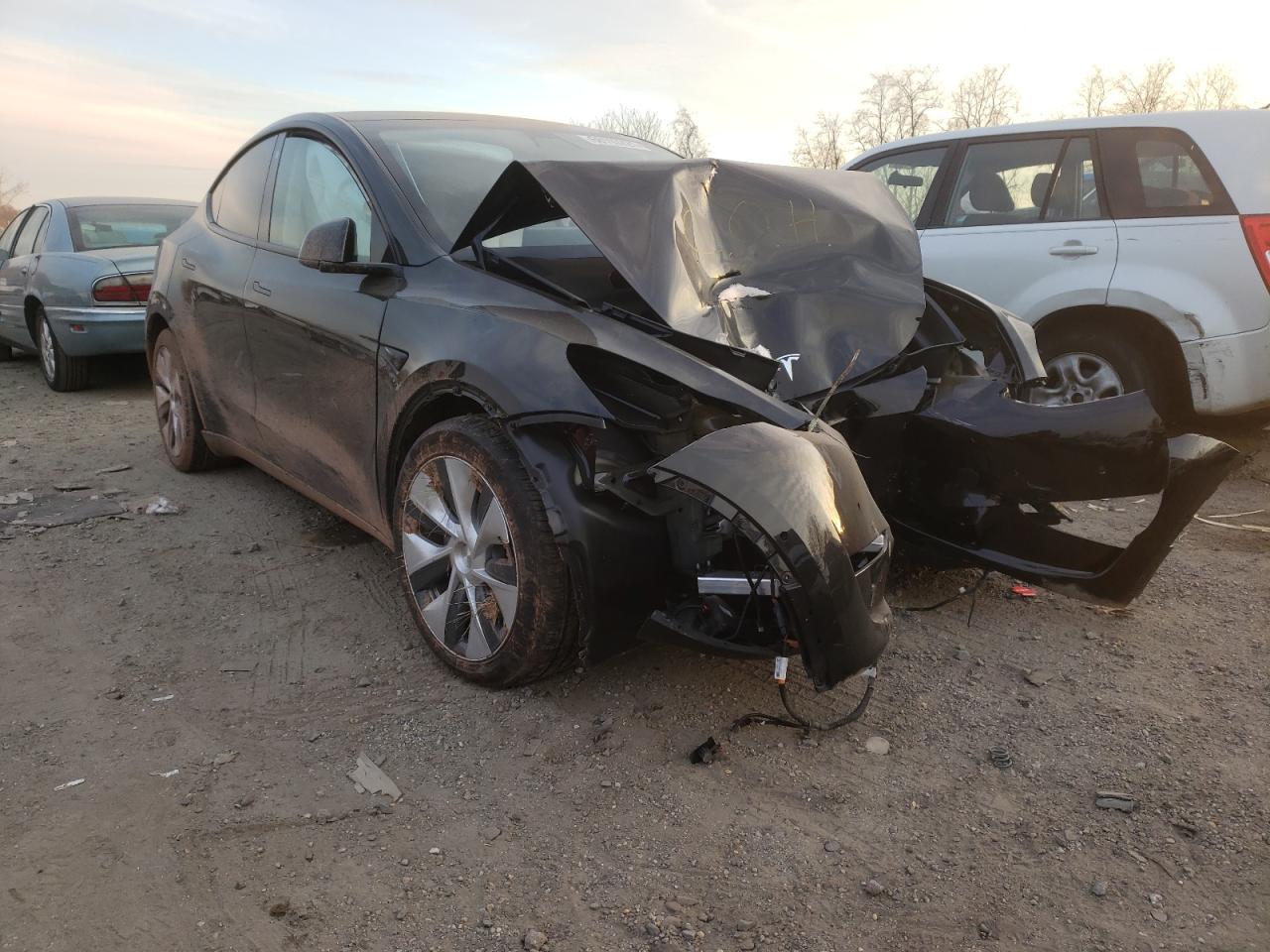 TESLA MODEL Y 2021 with VIN 7SAYGAEE5NF308737 - Photo from auction