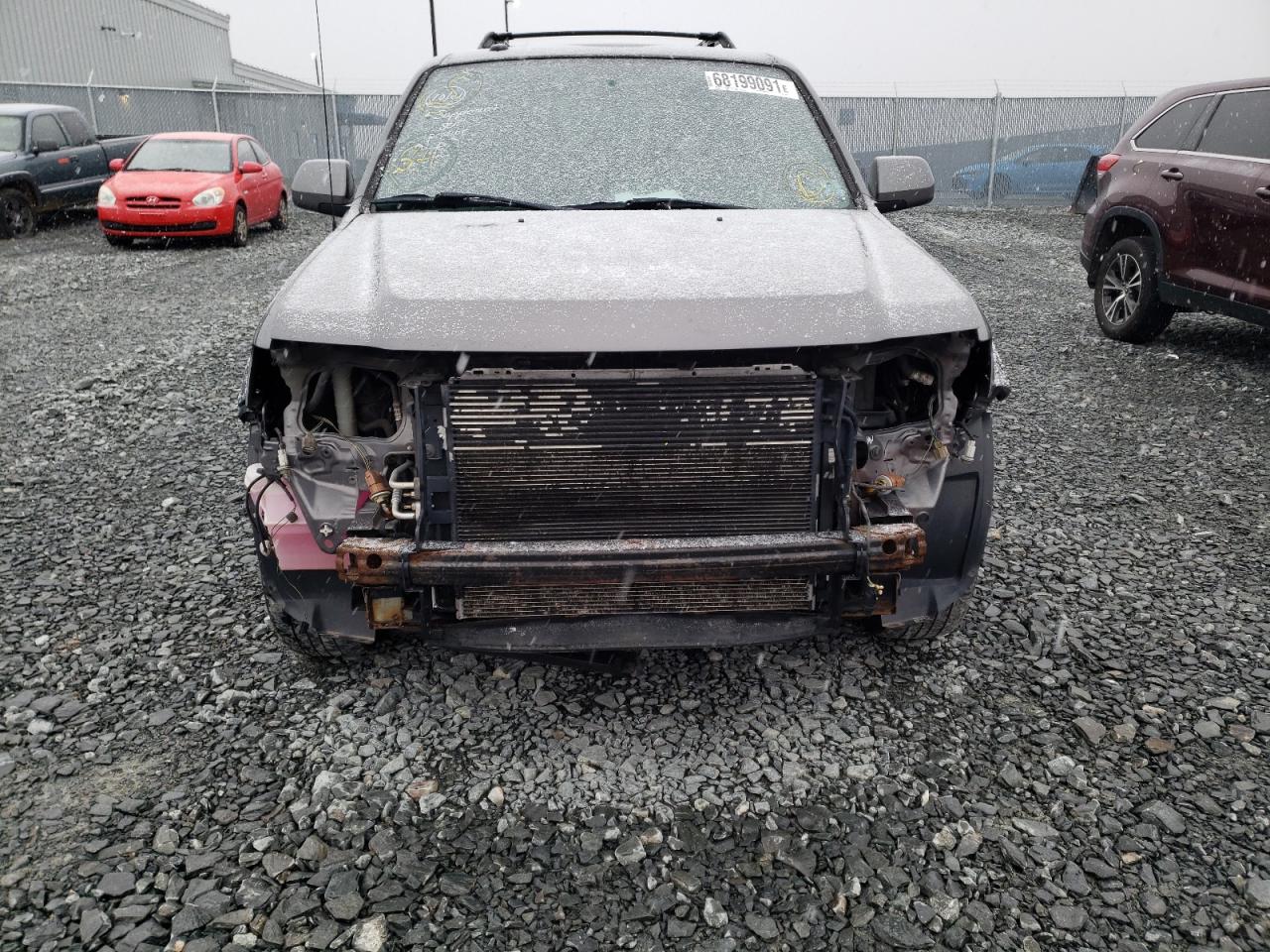 Photo 9 from auction – 2010 FORD ESCAPE LIM with VIN 1FMCU9EGXAKD13957