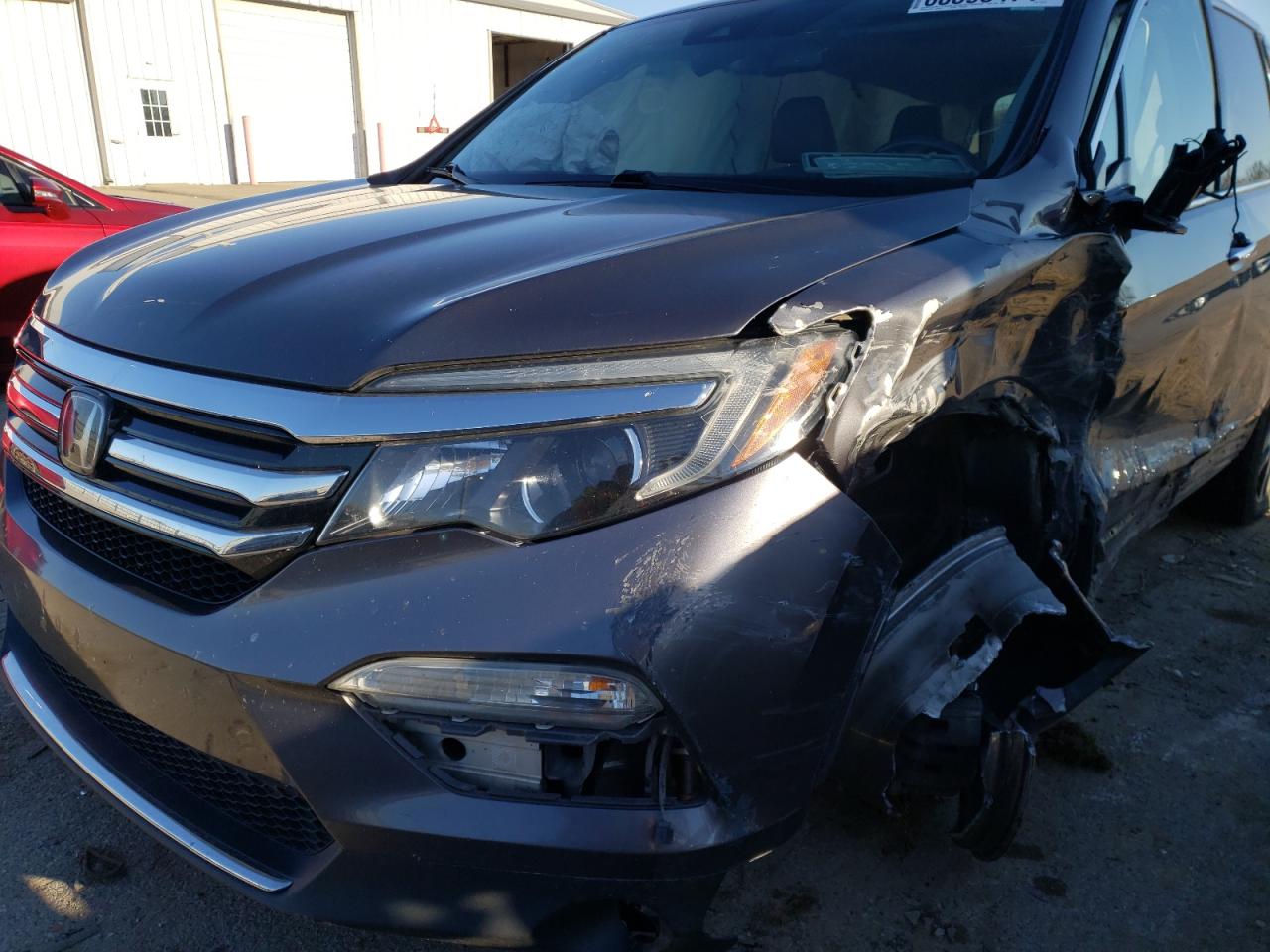 Photo 9 from auction – 2017 HONDA PILOT TOUR with VIN 5FNYF6H95HB022516