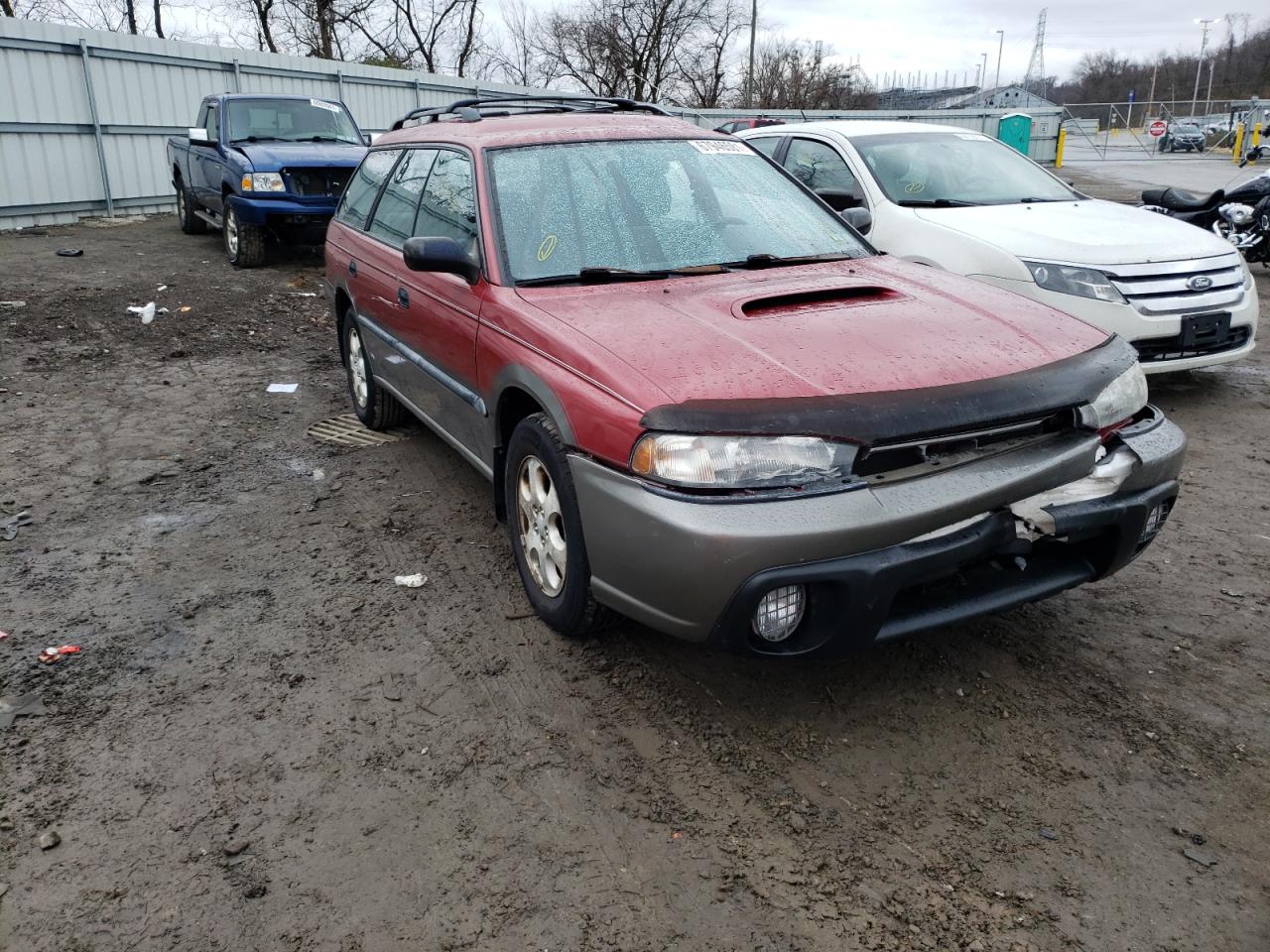 SUBARU LEGACY OUT 1997 with VIN 4S3BG6853V7606107 - Photo from auction