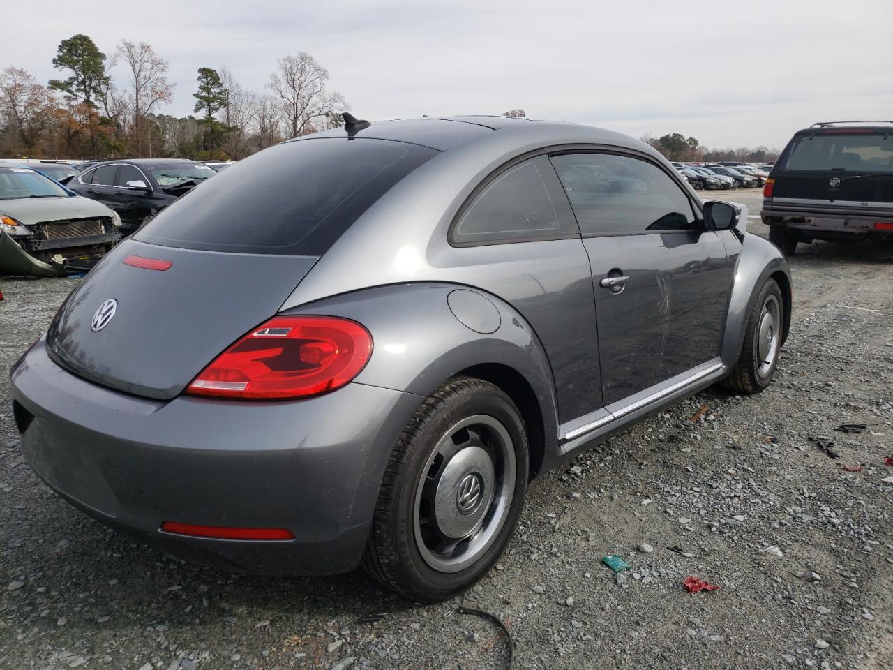 Photo 4 from auction – 2013 VOLKSWAGEN BEETLE with VIN 3VWJX7AT6DM636035