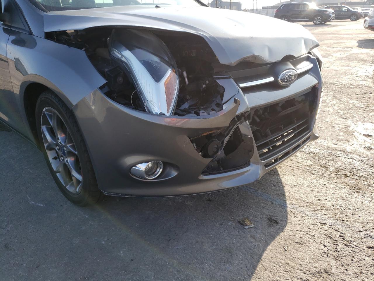 Photo 9 from auction – 2013 FORD FOCUS SE with VIN 1FADP3F28DL113776