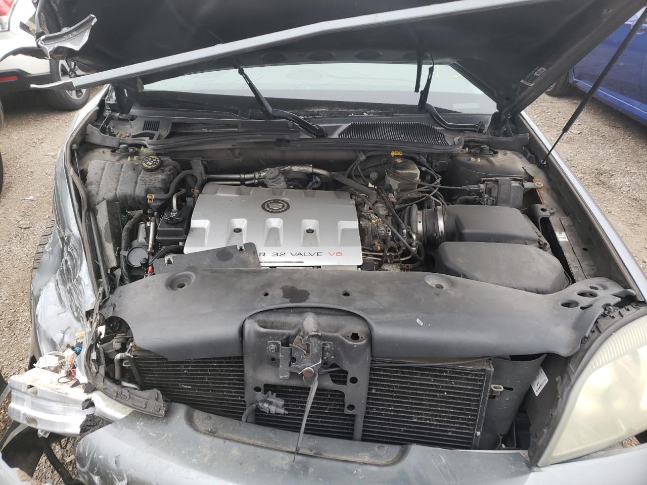 Photo 7 from auction – 2003 CADILLAC DEVILLE with VIN 1G6KD54Y83U182007