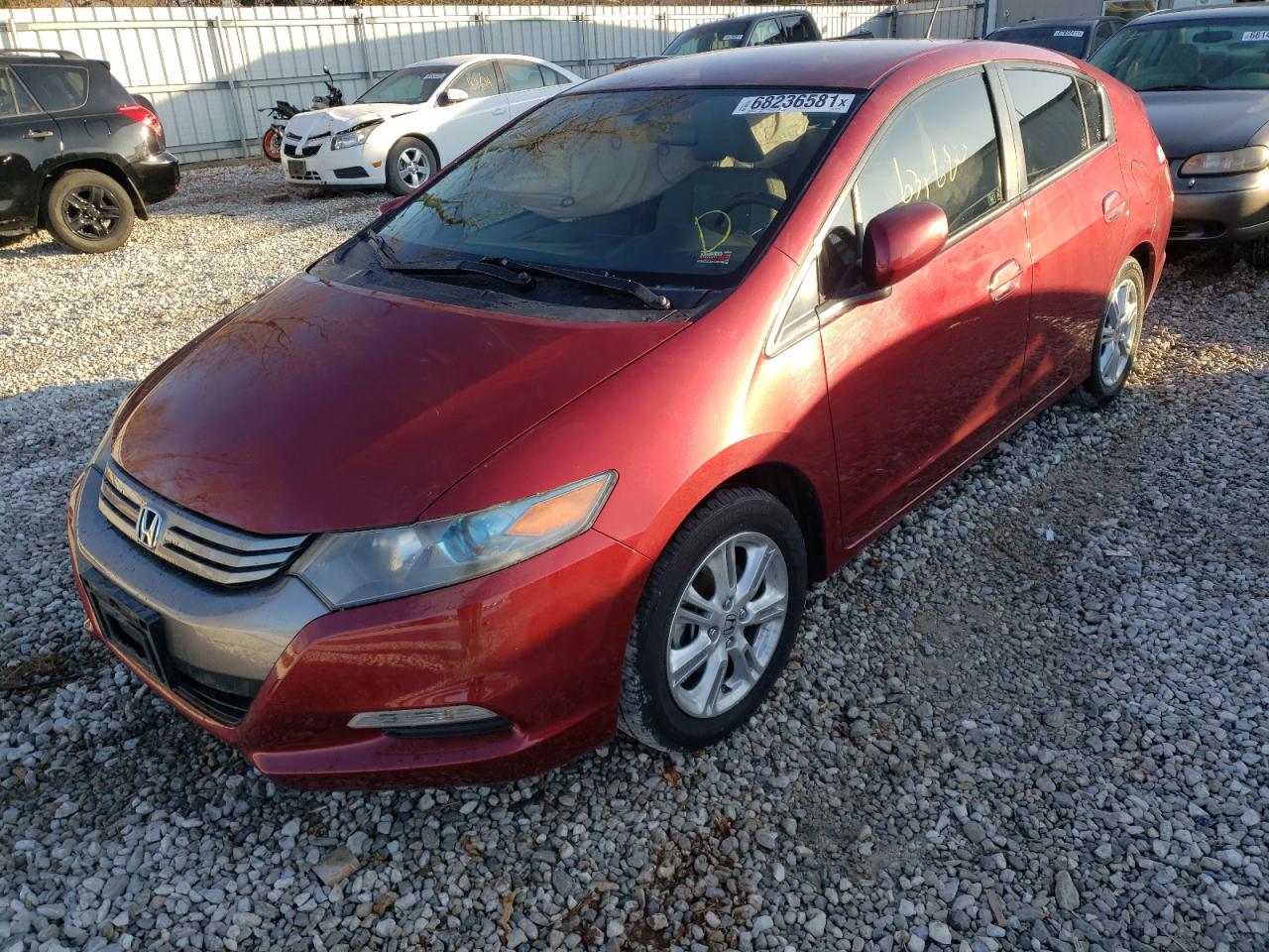 Photo 2 from auction – 2010 HONDA INSIGHT EX with VIN JHMZE2H75AS025566