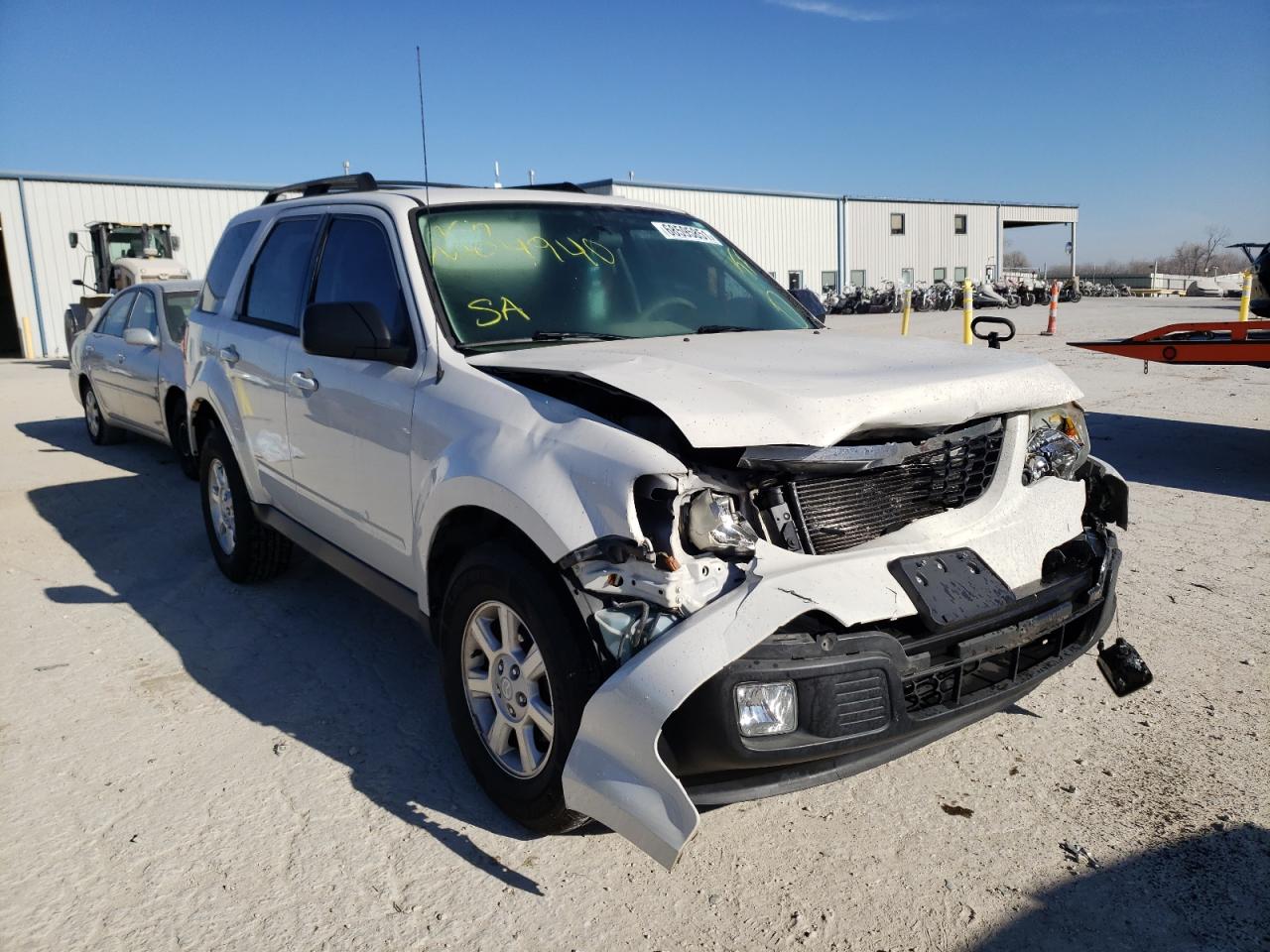 MAZDA TRIBUTE I 2011 with VIN 4F2CY0C79BKM04940 - Photo from auction