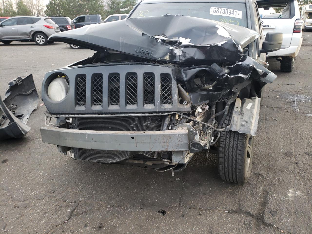 Photo 9 from auction – 2014 JEEP PATRIOT SP with VIN 1C4NJPBAXED754847
