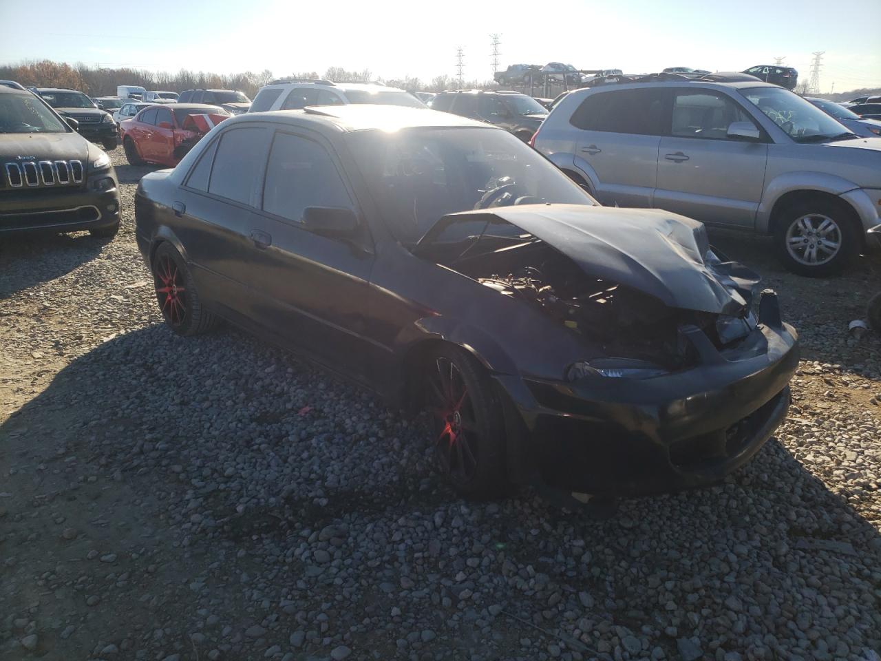 MAZDA PROTEGE ES 1999 with VIN JM1BJ2211X0183734 - Photo from auction