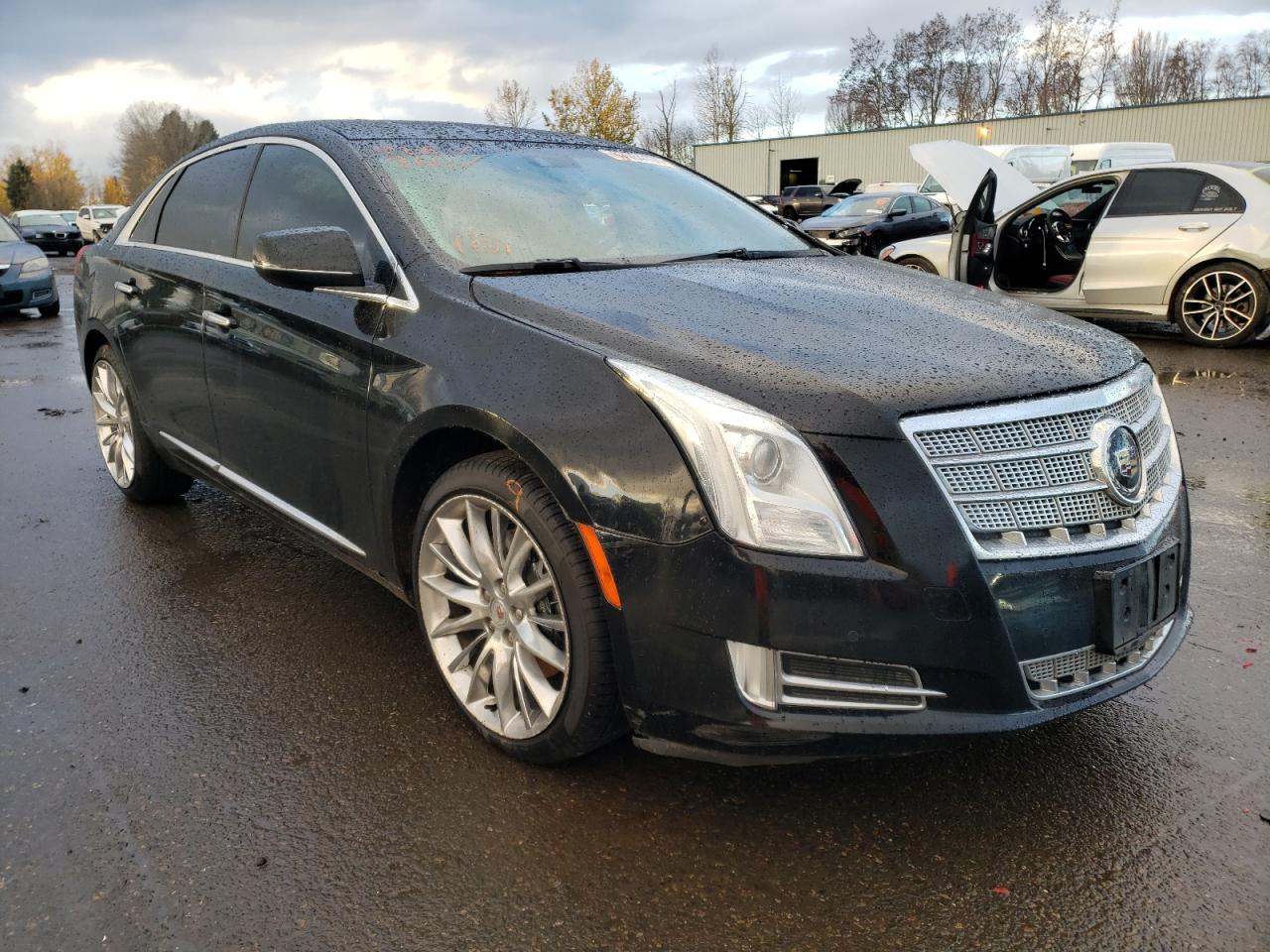 CADILLAC XTS PLATIN 2013 with VIN 2G61V5S30D9218741 - Photo from auction