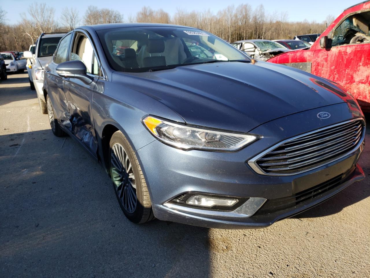 FORD FUSION TIT 2018 with VIN 3FA6P0RU7JR120462 - Photo from auction