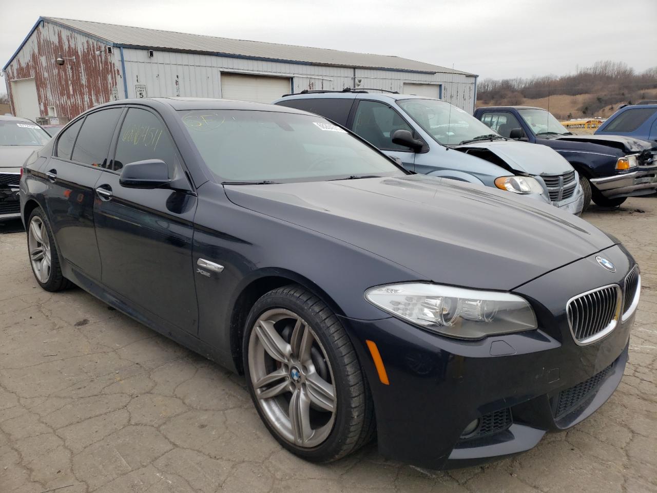 BMW 535 XI 2011 with VIN WBAFU7C52BC877635 - Photo from auction