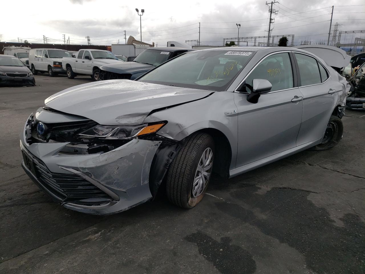 Photo 2 from auction – 2021 TOYOTA CAMRY LE with VIN 4T1C31AK9MU550706