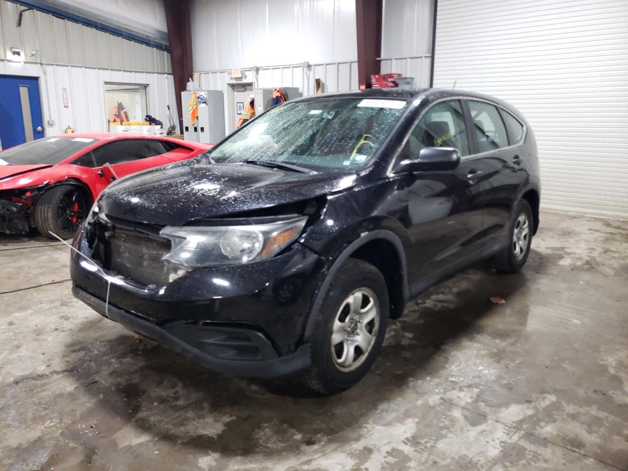Photo 2 from auction – 2014 HONDA CR-V LX with VIN 2HKRM4H35EH710829
