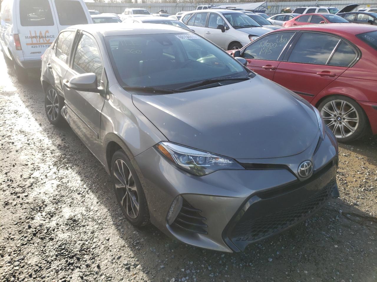 TOYOTA COROLLA L 2018 with VIN 5YFBURHE7JP780491 - Photo from auction