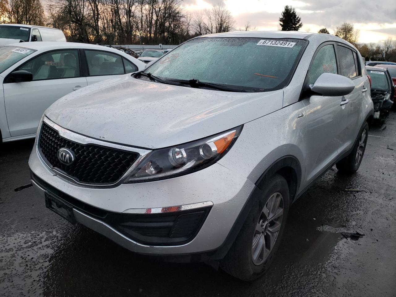 Photo 2 from auction – 2014 KIA SPORTAGE L with VIN KNDPBCAC3E7548978