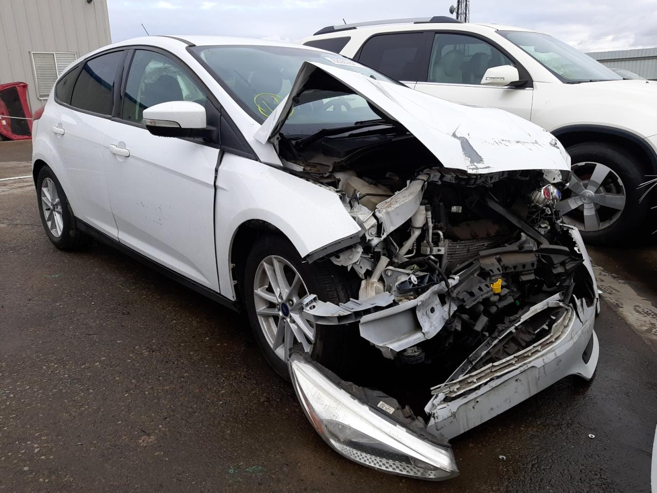 FORD FOCUS SE 2017 with VIN 1FADP3K27HL296213 - Photo from auction