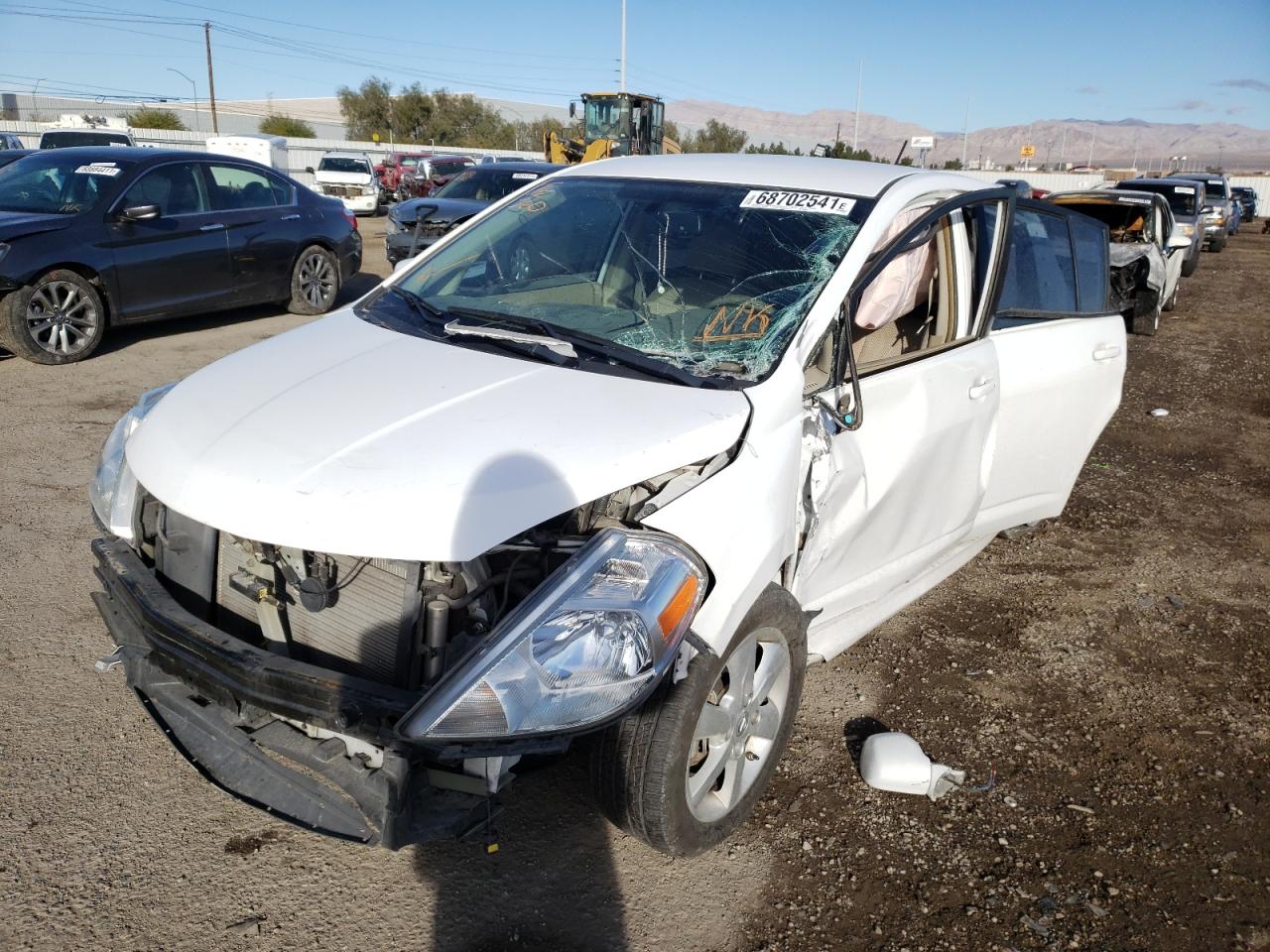 Photo 2 from auction – 2012 NISSAN VERSA S with VIN 3N1BC1CPXCK288625