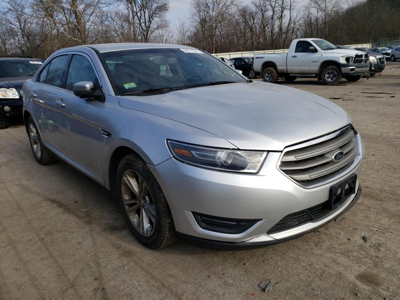 FORD TAURUS SEL 2014 with VIN 1FAHP2E83EG162587 - Photo from auction