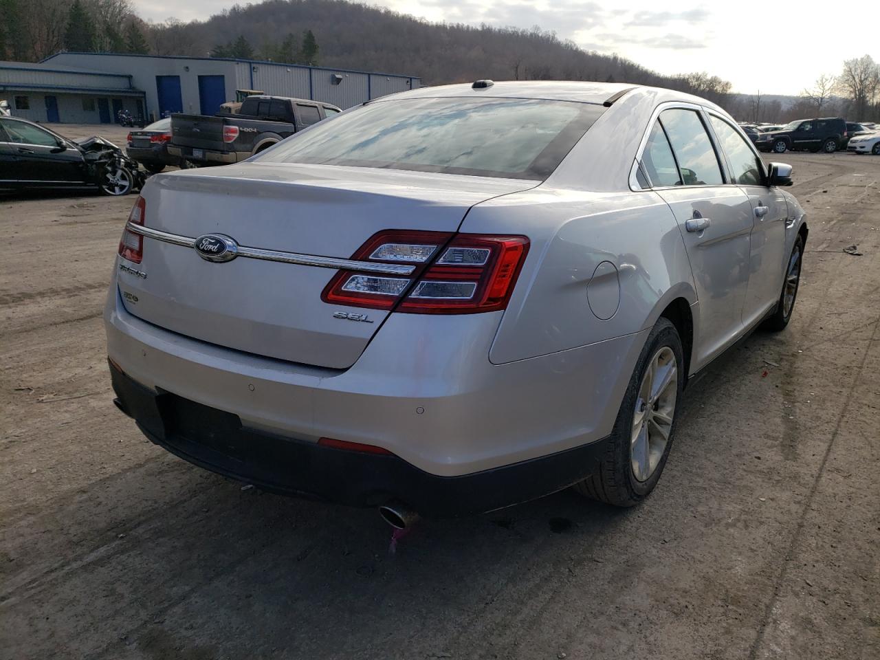 Photo 4 from auction – 2014 FORD TAURUS SEL with VIN 1FAHP2E83EG162587