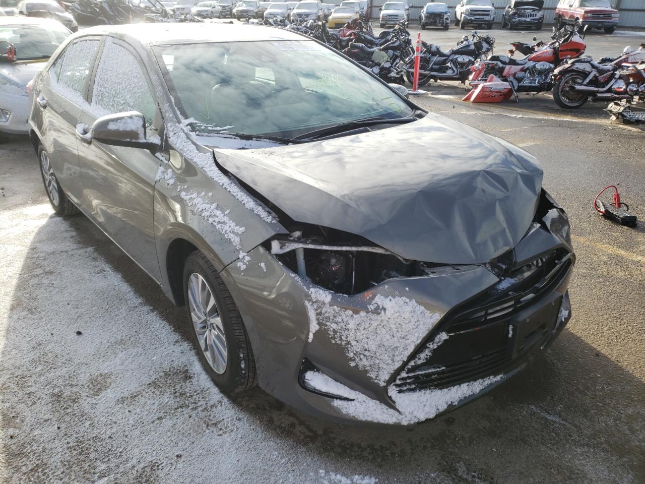 TOYOTA COROLLA LE 2017 with VIN 2T1BPRHE5HC859403 - Photo from auction
