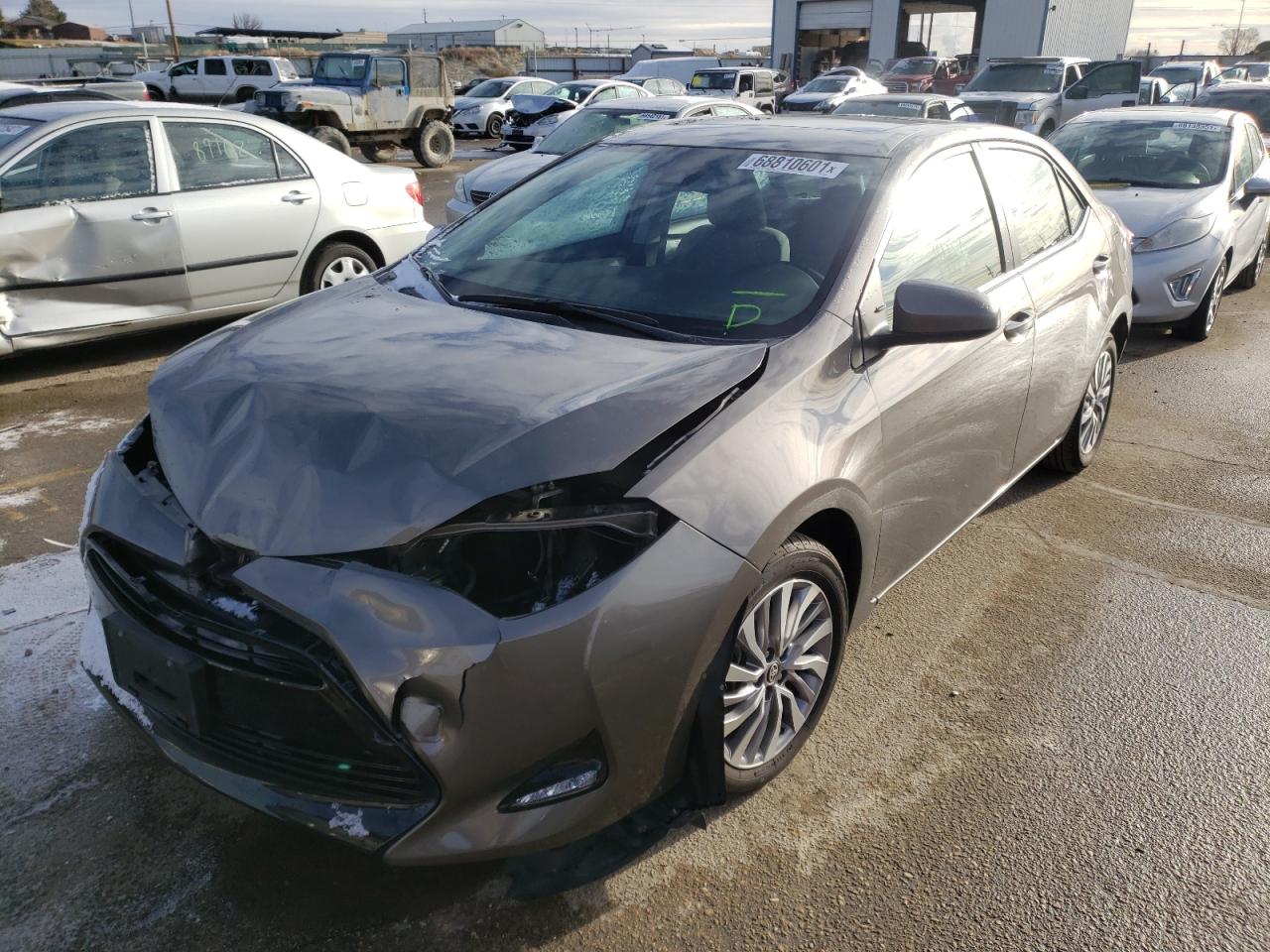 Photo 2 from auction – 2017 TOYOTA COROLLA LE with VIN 2T1BPRHE5HC859403
