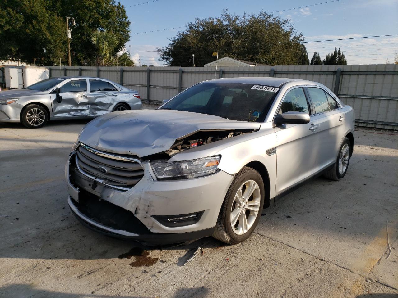 Photo 2 from auction – 2013 FORD TAURUS SEL with VIN 1FAHP2E8XDG174296