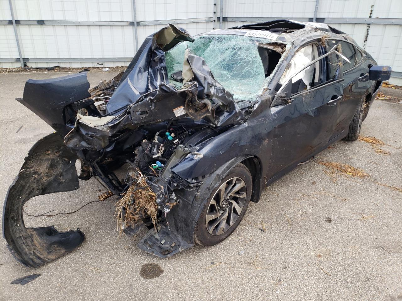 Photo 2 from auction – 2018 HONDA CIVIC EX with VIN 19XFC2F75JE010808