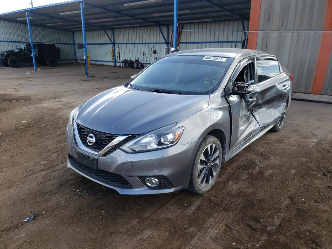 Photo 2 from auction – 2016 NISSAN SENTRA S with VIN 3N1AB7AP1GY239059