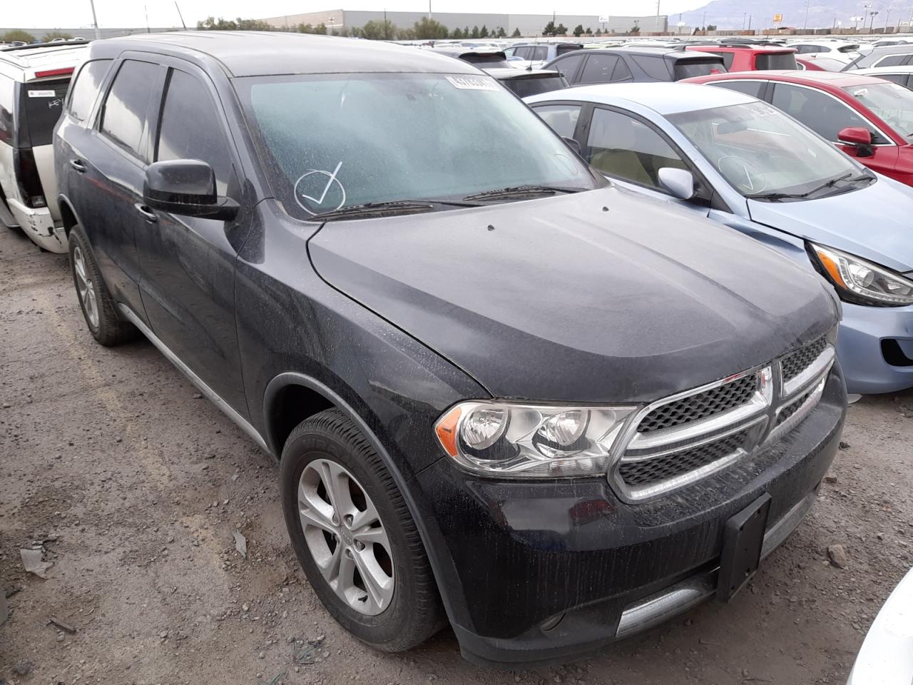 DODGE DURANGO SX 2013 with VIN 1C4RDHAG0DC697731 - Photo from auction