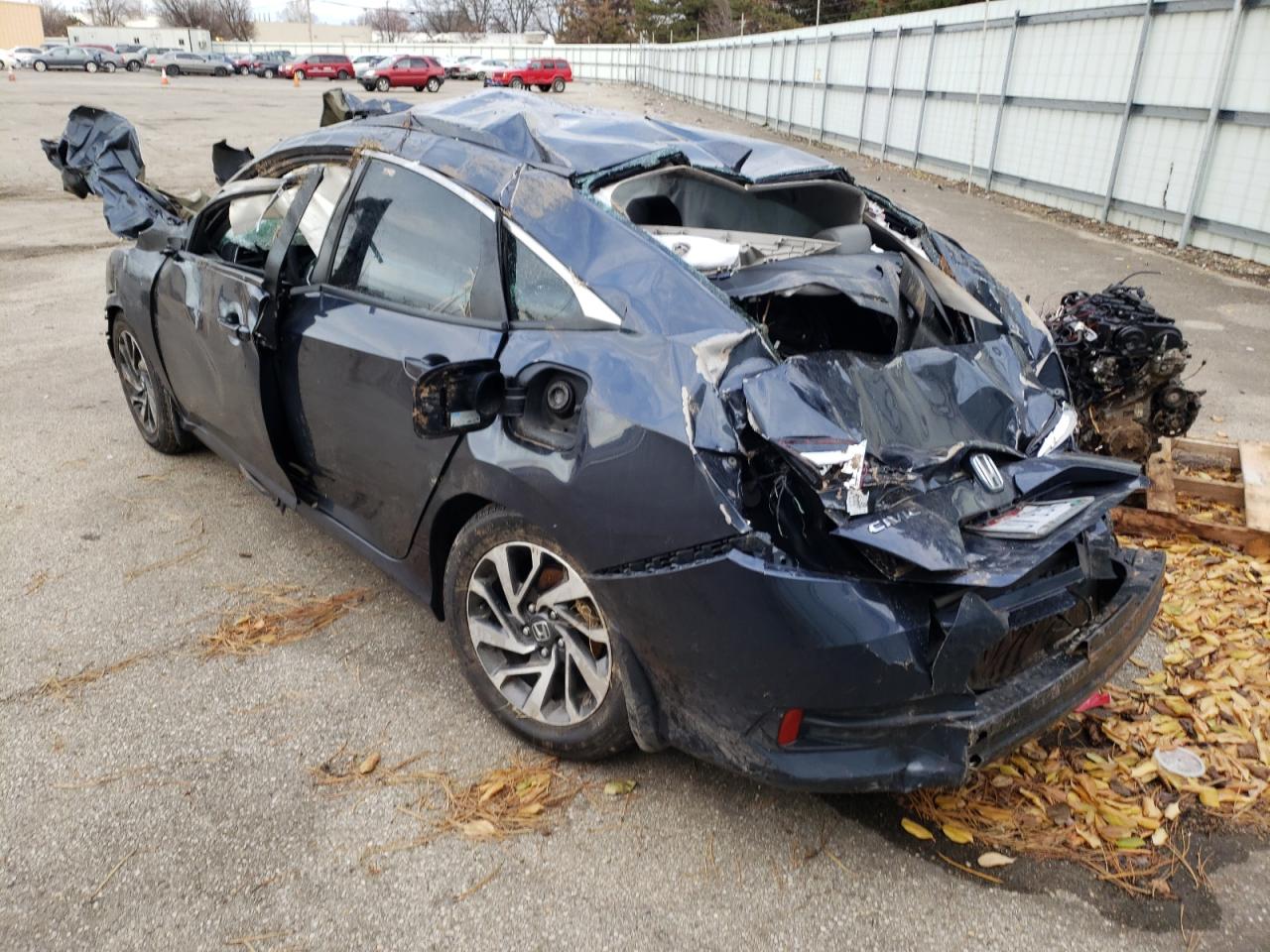 Photo 3 from auction – 2018 HONDA CIVIC EX with VIN 19XFC2F75JE010808