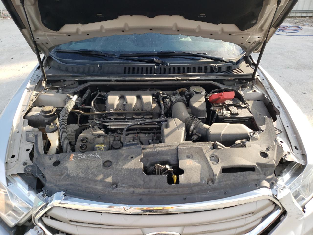 Photo 7 from auction – 2013 FORD TAURUS SEL with VIN 1FAHP2E8XDG174296