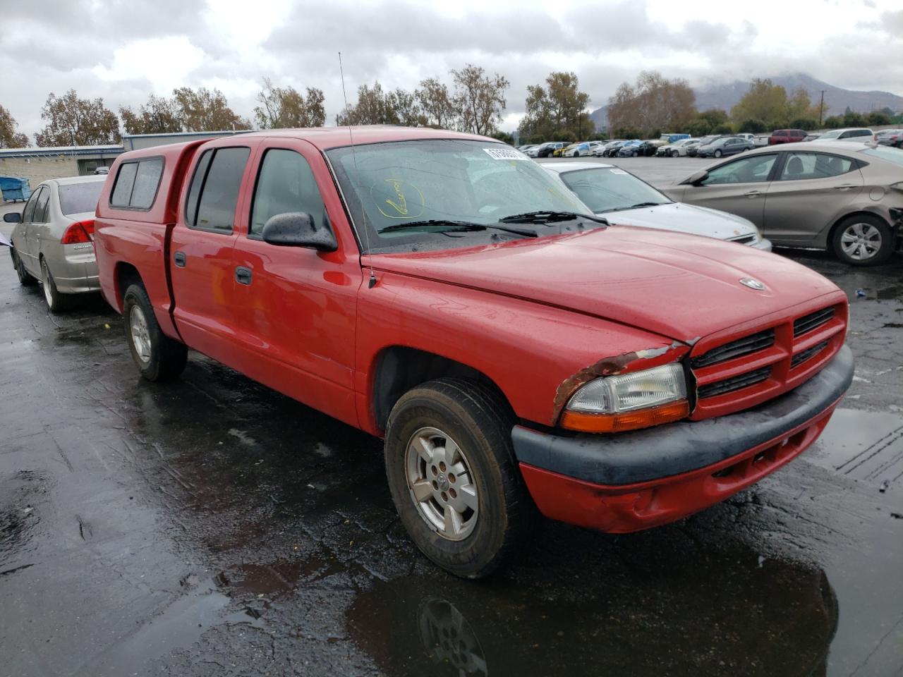 DODGE DAKOTA QUA 2002 with VIN 1B7HL38X32S661462 - Photo from auction
