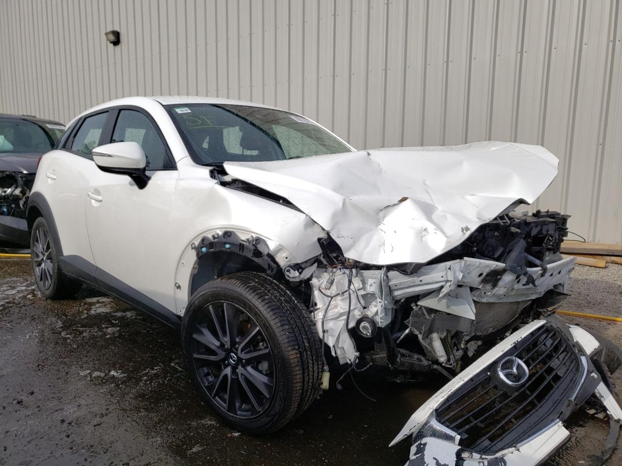 MAZDA CX-3 TOURI 2018 with VIN JM1DKDC74J1324785 - Photo from auction