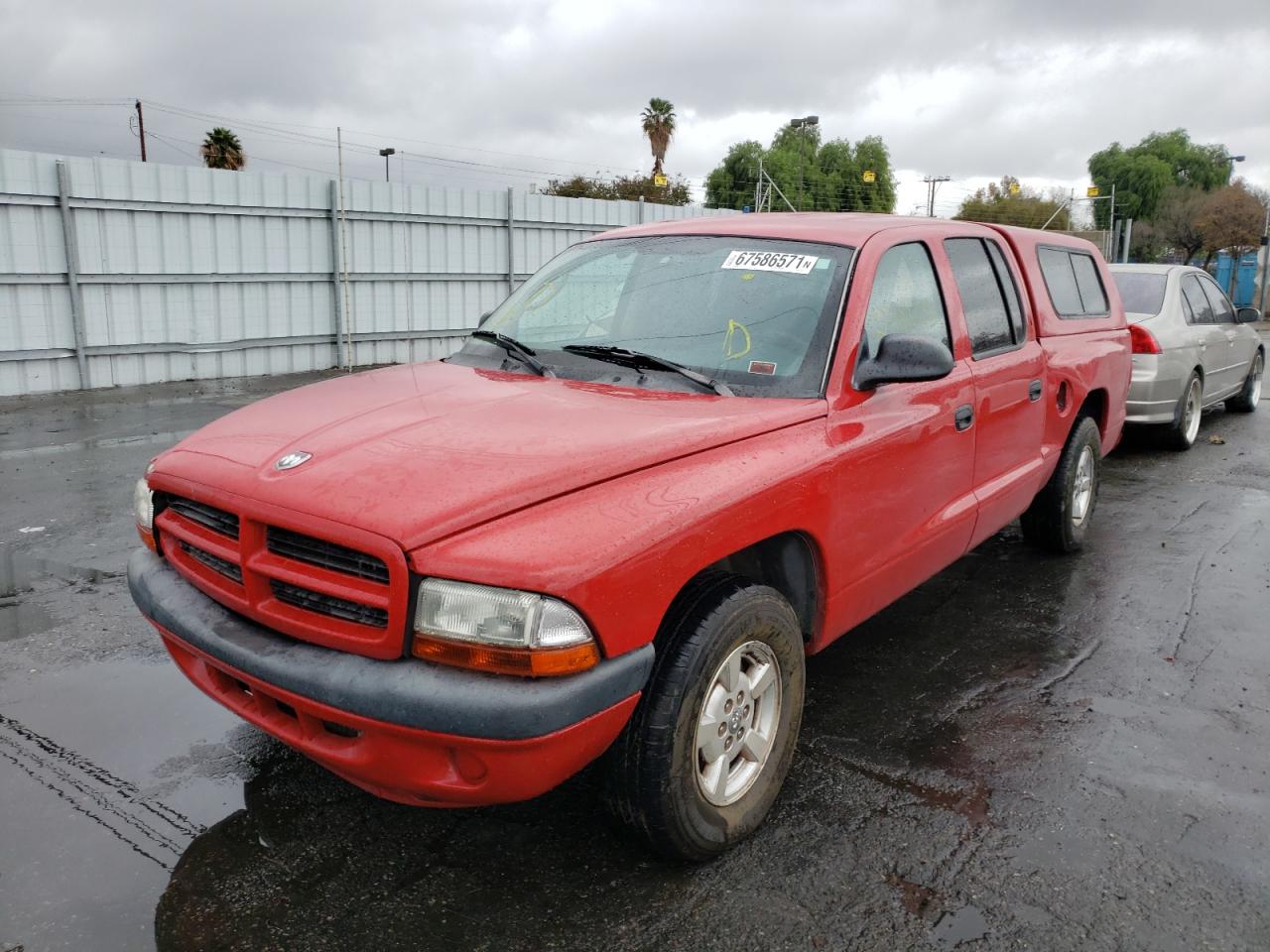 Photo 2 from auction – 2002 DODGE DAKOTA QUA with VIN 1B7HL38X32S661462