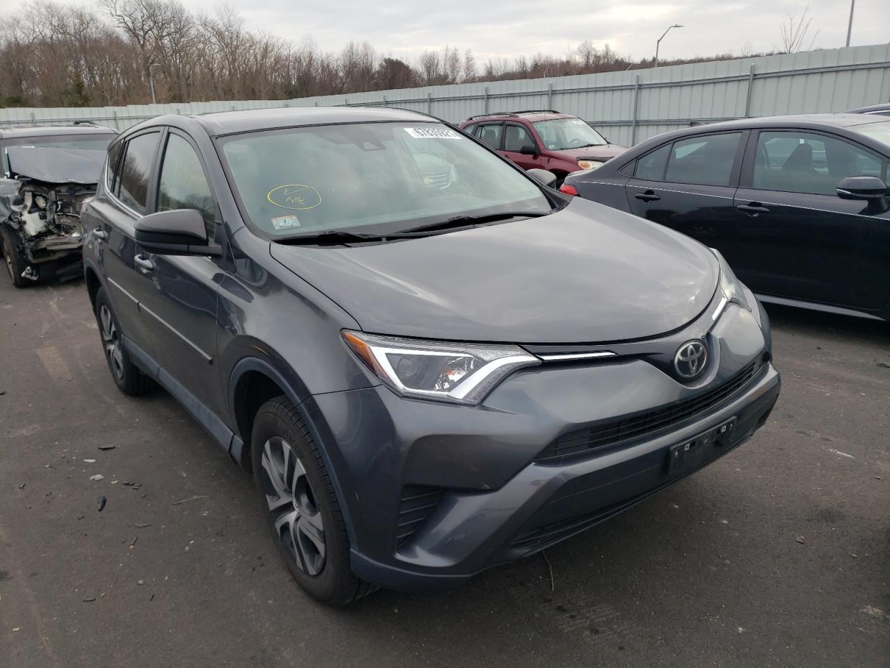Photo 1 from auction – 2018 TOYOTA RAV4 LE with VIN 2T3BFREV7JW782620